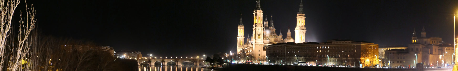 Photo qui montre La légendaire basilique de la Nuestra Señora del Pilar de nuit | Cliquer pour agrandir